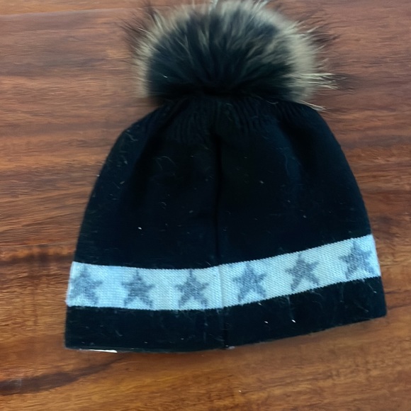 C.C kids hat with fuzzy top. - Picture 2 of 3